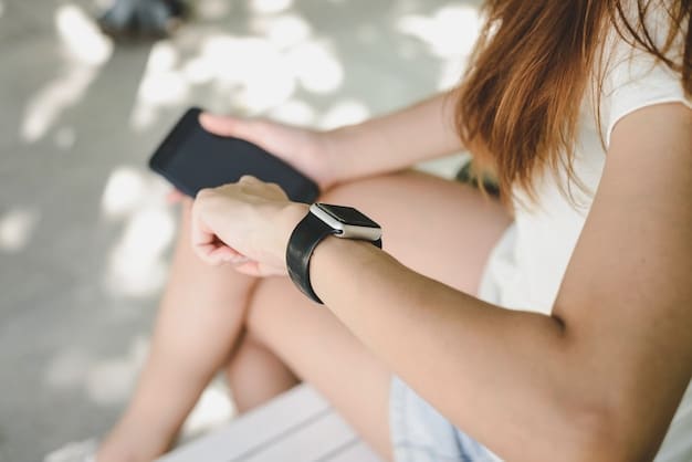 Close-up of a woman's hands adjusting a smartwatch while wearing athleisure attire. The focus is on the smartwatch and the sleek, tech-integrated clothing, highlighting the fusion of technology and fashion in athleisure.