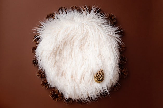 A close-up shot of various winter fabrics like velvet, cashmere, and faux fur in rich, jewel-toned colours, showcased on a table with festive decorations.