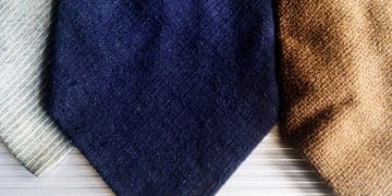 The Ultimate Guide to Men's Suit Fabrics 2025: Choose the Perfect Material - Cover Image