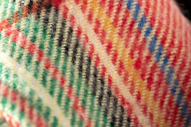 A detailed image of a finely woven wool suit fabric, highlighting its texture and drape, with a swatch of different colors available in wool suits.