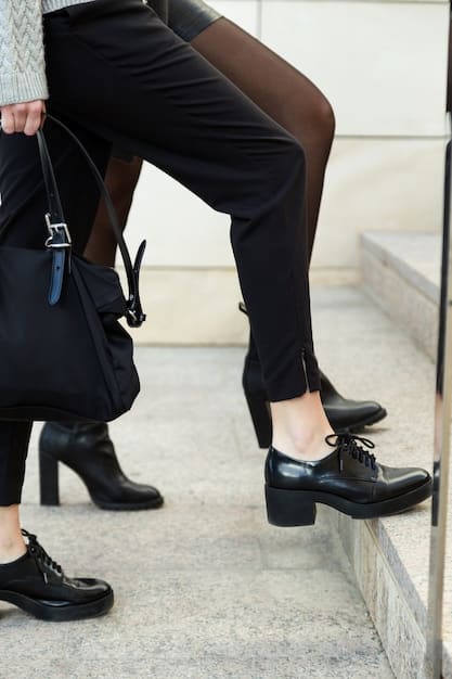 A close-up shot featuring different footwear options paired with a little black dress. Focus is on the contrast between the dress and the casual shoes, like white sneakers, brown ankle boots, and colorful flats.