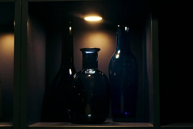 A well-organized drawer or cabinet showcasing various perfume bottles neatly arranged and stored in a cool, dark place.