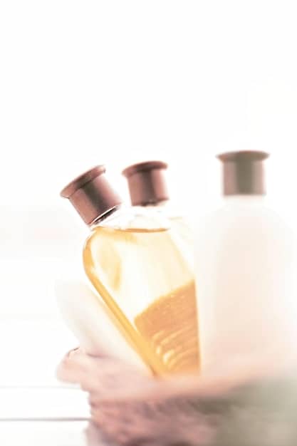 A close-up shot of various fragrance dupe bottles lined up on a shelf, highlighting their simple yet elegant packaging. The background is blurred to focus on the bottles.