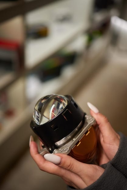 A close-up of a perfume bottle being carefully placed back into its original box after use. The box is stored in a dark, cool drawer.
