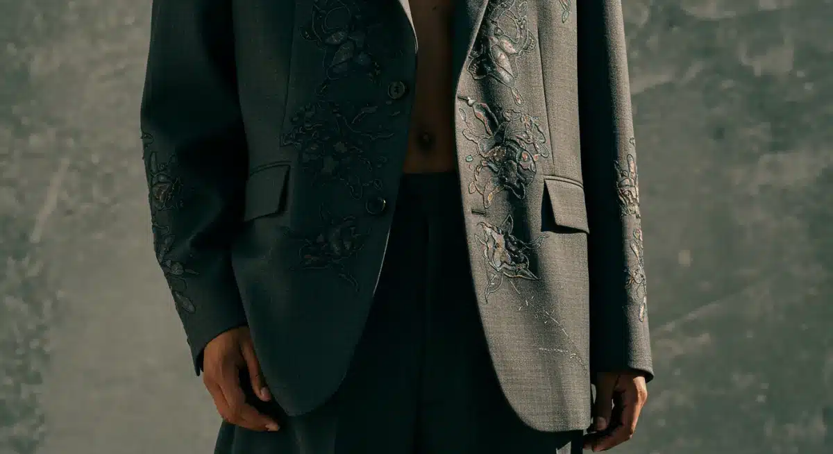 Detail of tailored gender-fluid blazer and trousers
