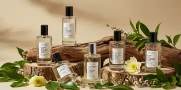 Sustainable fragrance bottles with natural elements.